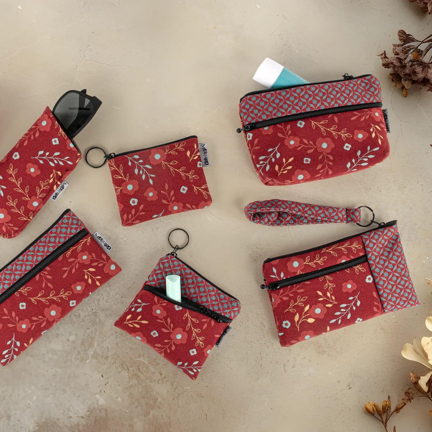 A variety of accessory bags shown.