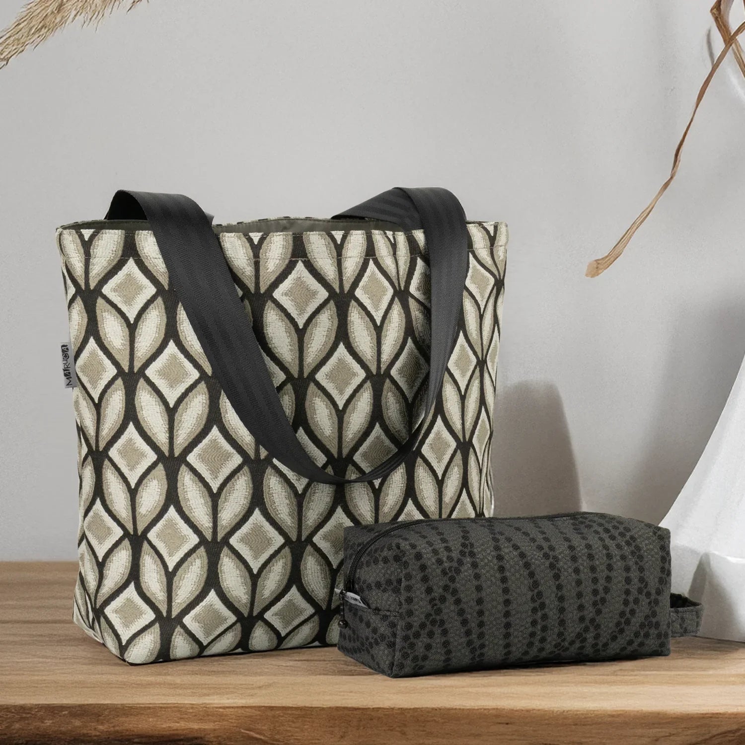 Bags shown include the Duffel Bag and the Traveler Bag.